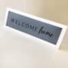 Welcome home leather sign