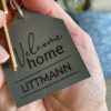 WElcome home personalized leather new home keychain
