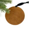 Backside of brown leather Christmas Ornament