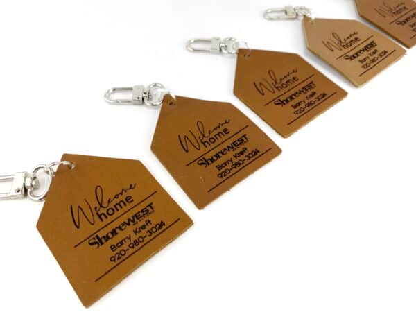 Personalized leather keychain with logo and contact info for clients