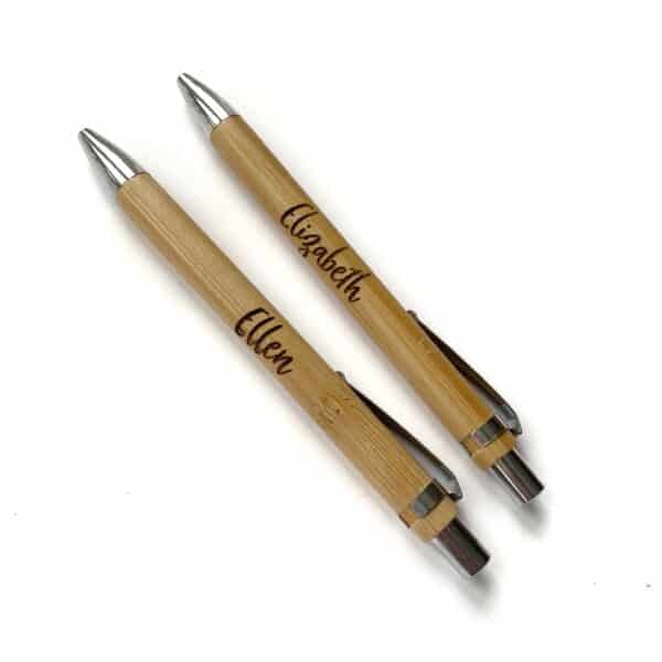 Image shows two personalized Bamboo pens with the names Ellen and Elizabeth engraved on them